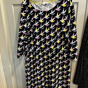 Heavier cotton dress, sort of sweatshirt material but not completely.  Wide neck